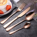 Modernes 4-teiliges Besteckset aus roségoldenem Edelstahl mit Messer, Gabel und Löffeln - Roségold 4-teiliges Set