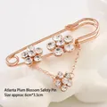 Rose gold plum blossom brooch with inlaid crystals on safety pin style 6cm x 3.5cm - No. 30-Rose Gold Plum Blossom Pin