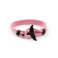 Pink braided rope bracelet with a black metal whale tail charm on a white background - Black Whale Tail Buckle / Pink