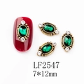 Detailed view of LF2547 emerald green oval nail art rhinestone with gold alloy setting - 2547 Deep Green