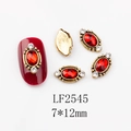 Detail of oval red gemstone nail art charms with vintage gold setting and rhinestones - 2545 Red