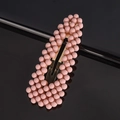 Close-up of golden BB hair clip featuring matte pink bead embellishments for women - Pink Waterdrop