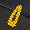 Close-up of yellow pearl-beaded BB hair clip with a minimalist metal base - Yellow Waterdrop