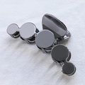 Geometric hair claw clip in gunmetal grey finish with circular minimalist design - Gunmetal