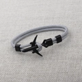 Detail showing grey parachute cord weave and black metal airplane charm on bracelet - Grey (BPL2-16)