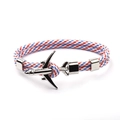 Detail of red white and blue braided cord bracelet with silver airplane and anchor clasp - Red/White/Blue