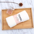 White coral fleece towel rolled in premium paper wrap on a wooden tray decor - 35*75cm / White