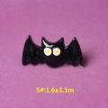 Detail of a black resin bat charm with white eyes for DIY Halloween accessories - Style 5 Black Bat
