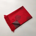 Detailed close-up of thick red cashmere-feel scarf featuring tree motifs and fringe edge - Tree Pattern #7