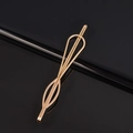 Minimalist golden hollow heart and star shaped alloy hair clip on reflective black surface - Bowknot Metal Bobby Pin