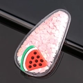 Nahaufnahme von Herz-Pailletten und 3D-Wassermelonen auf einem süßen transparenten BB-Haarclip - Wassermelonenrot