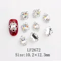 Détail de bijoux d'ongles en forme de nœud argenté avec cristal coloré de 10,2x12,3mm - Ovale AB (LF2672)