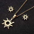 Golden sun necklace and earrings set with hollow design on black glitter background - Sun / Gold