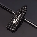 Elegant black beaded BB hair clip for women with silver metallic base on reflective surface - Black Waterdrop BB Clip