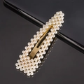 Elegant gold metal hair clip featuring rows of white pearls for a sophisticated look - 9cm Pearl Large Waterdrop Gold