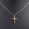 Close-up of gold-plated cross pendant necklace featuring micro-set zircon stones - Style C