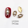 Detail view of oval faux pearl nail art charm with vintage gold alloy frame LF2555 - 2555 White Pearl