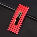 Detail showing pink matte pearl beads on a golden metal BB hair clip for women - Watermelon Red Rectangle