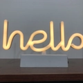 Modern LED neon desk lamp with warm yellow hello sign on a white base for decor - Hello (Warm White) With Base