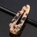 Detail shot of acetate tortoiseshell hair clip with golden metal duckbill mechanism - Acetate Beige Tortoise Waterdrop