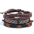 Detalle macro de pulseras étnicas de varias capas con cuero y texturas trenzadas - Combinación de Cuero y Tela con Patrón de Ondas Negro y Blanco (N018)