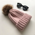 Pale pink knit beanie for women with large brown faux fur pom pom decoration - Lotus root pink