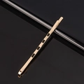 Minimalist golden hollow hairpin with metallic luster on reflective black background - Wavy Metal Bobby Pin