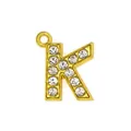 Macro shot of gold-plated letter K pendant with sparkling zircon micro-paving for DIY jewelry - 15mm Gold Rhinestone Letter K Pendant