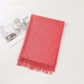 Pink cashmere-like scarf with fringe tassels flat lay with a magazine and coffee - Red