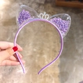 Detail of purple cat ear headband with flowing sequins and a sparkling silver crown - Purple Crown Sequins