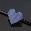 Macro shot of blue marble heart hair clip with glitter detail and metal fastener - Heart / Dark Blue