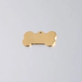 Custom gold bone-shaped stainless steel pet ID tag with a polished mirror finish - 16x31mm / Gold