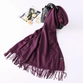 Detail of purple cashmere scarf with fringe, a luxury label, and elegant accessories - Dark Purple