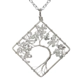 Detail of handmade wire wrapped square Tree of Life pendant with natural clear crystals - White Crystal