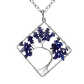 Close-up detail of handmade wire-wrapped Tree of Life pendant featuring deep blue lapis stones - Lapis Lazuli