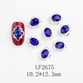 Détails de bijoux à ongles en forme de nœud argenté avec strass ovales bleu foncé et taille - Ovale Bleu Foncé (LF2675)