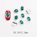 Détail de bijoux d'ongles en cristal vert émeraude sur monture argentée, taille 10,2x12,3mm - Ovale Émeraude (LF2671)