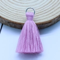 Light purple polyester cotton tassel pendant with a silver metal ring connector - Pink Purple