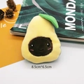 Detail shot of a plush avocado brooch accessory on a white surface with size labels - 5-1# Large Avocado With Leaf Brooch Pin