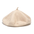 Detail of soft cream wool knit beret showing textured fabric and classic top stalk - M (56-58cm) / Off White