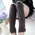 Brown cable knit leg warmers for women with ribbed elastic cuffs in a cozy winter style - One Size / Dark Gray