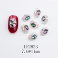 Detailed view of silver oval alloy nail charms with crystals and pearls in 7.6*11mm size - Japanese Style Oval Nail Charm (2823) / 10 Pieces Pack