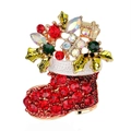 Detail of Christmas stocking brooch with red rhinestones and green enamel leaves - Red Rhinestone Boot