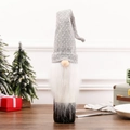 Christmas gnome wine bottle cover with grey knitted hat and long white beard on wooden table - Style A Grey White Polka Dot