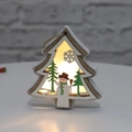 Detail view of a wooden Christmas tree pendant with warm LED lights and snowman carving - Christmas Tree