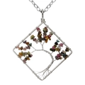 Detailed view of handmade silver wire wrapped tree of life pendant with colorful stones - Tourmaline