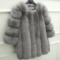 Detailed view of gray faux fur coat with long sleeves hanging against white wall - S / Gray