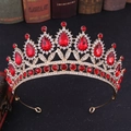 Detailed macro view of luxury baroque golden crown with red crystals and rhinestones - Gold with Red Rhinestones