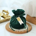 Dark green velvet wedding favor pouch with gold Xi charm and thank you tag on a coaster - Xi Character Pendant / Dark Green