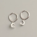 Close-up of S925 sterling silver moon earrings featuring sparkling inlaid diamonds - 925 Silver / Platinum Silver Color (Pair)